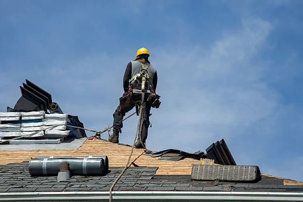 Professional Metal Roofing technician working in Oxford, IA